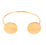 צמיד קשיח עם עיגולים וחריטה עליו